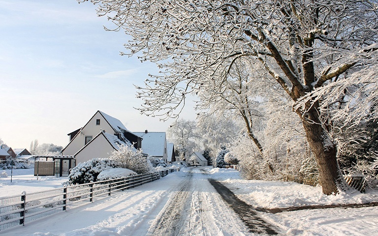 Village-town-snow-landscape-thick-snow-road-houses-trees_1920x1200.jpg