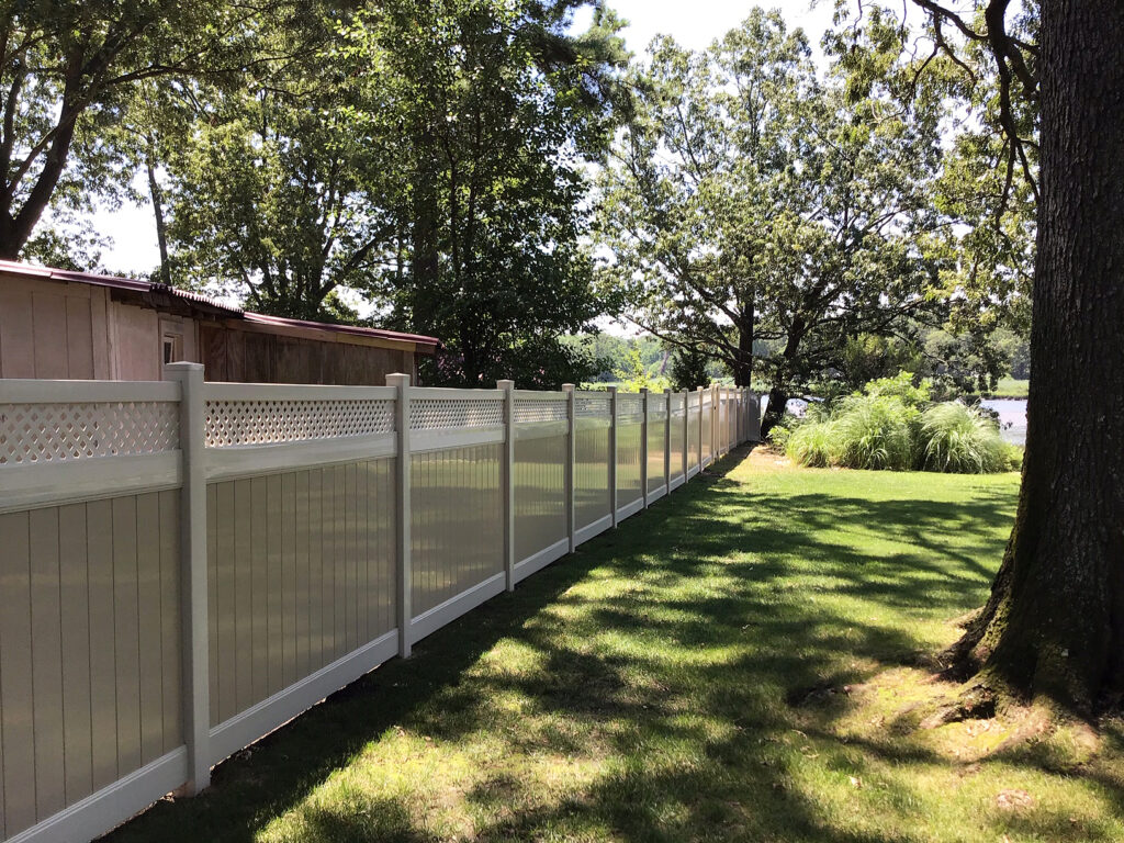 tan vinyl fencing with lattice section on top